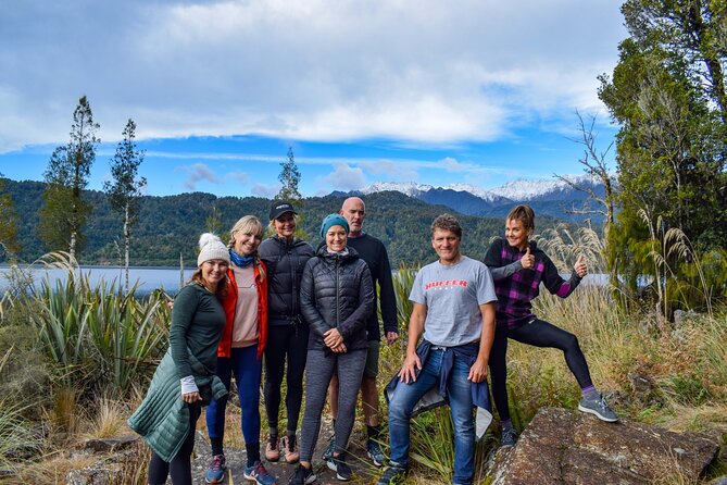 4-hour Lake Mapourika Kayak and Hike adventure, with Okarito Kiwi Sanctuary - Paddling the glassy water of Lake Mapourika