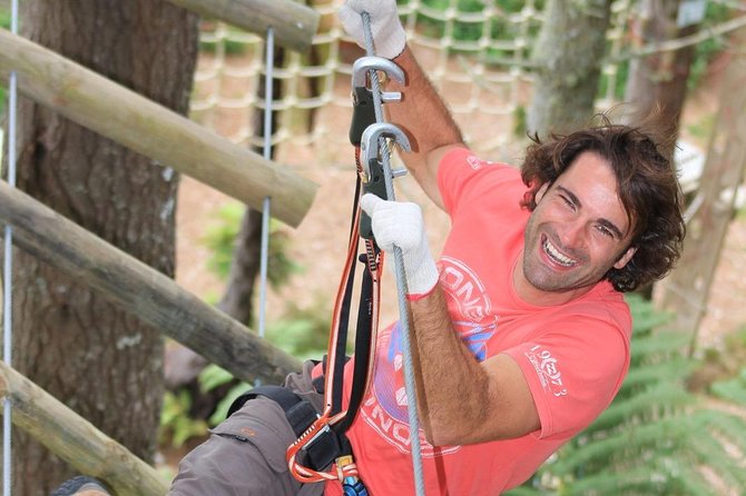 Adrenalin Forest Auckland - Moving higher through barrels, jumps, and flying foxes