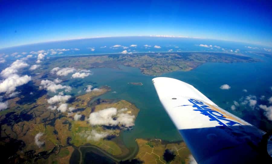 Auckland: 13000, 16000, or 18000-Foot Tandem Skydive - The climb above Parakai