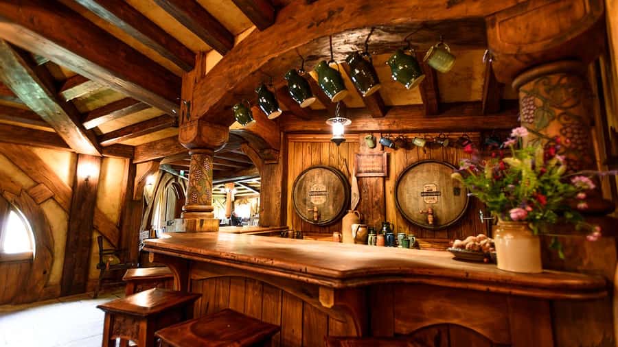 Auckland: Hobbiton, Waitomo Caves, and Rotorua 1-Way Tour - Waitomo Glowworm Caves and the boat beneath the lights