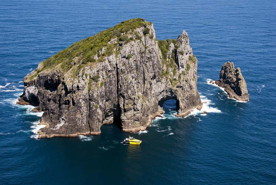 Bay of Islands: Discover the Bay Cruise with Island Lunch - Boarding the custom-built power cat at Paihia