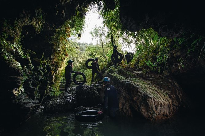 Black Water Rafting Experience Waitomo Caves Tour - Getting suited up for Ruakuri Cave