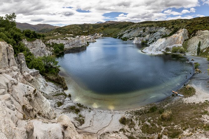 Dunedin to Queenstown One Way Tour Including Taieri Gorge Train - St. Bathans and the strange Blue Lake
