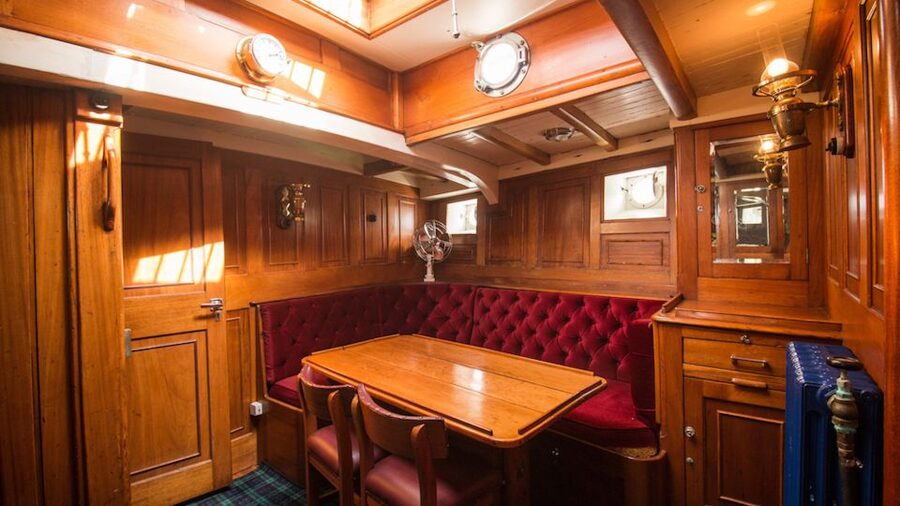 Evening Champagne Cruise on Historic 1935 Motor Yacht. - The stories behind the yacht and the lake