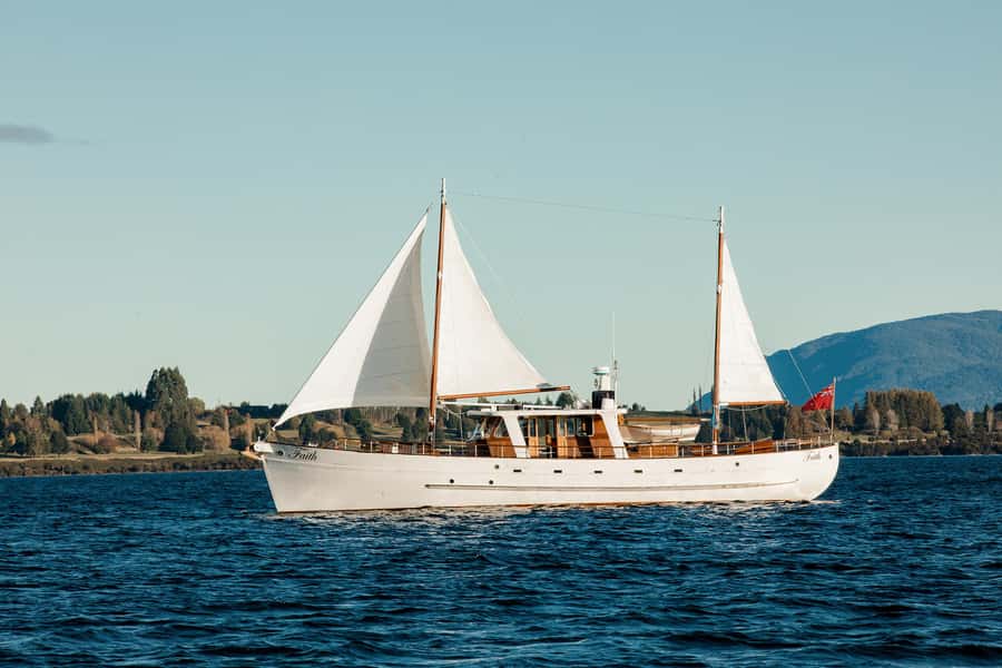 Evening Champagne Cruise on Historic 1935 Motor Yacht. - Meeting Faith at Te Anau’s historic wharf