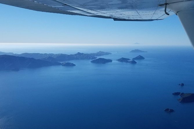 Flight Experience our Water and Wilderness Scenic Tour - The remote grass airstrip and beach stop