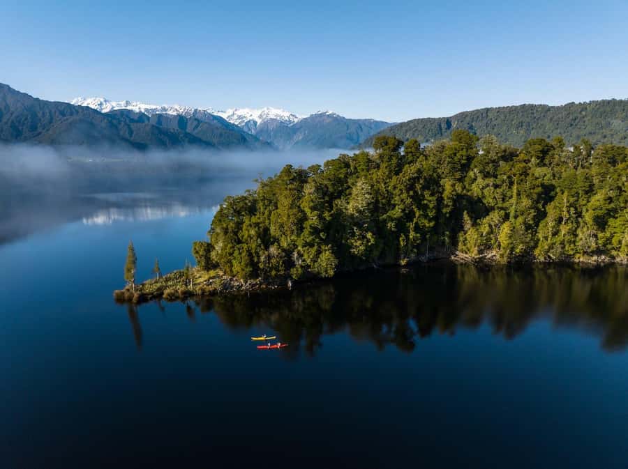 Franz Josef: Kayak & Walking Tour to Okarito Kiwi Sanctuary - The one-hour paddle across the lake