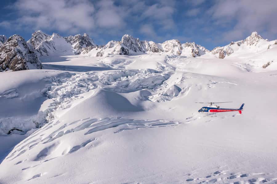 Franz Josef: Mountain Scenic 40-Minute Helicopter Flight - Stepping onto the snow landing