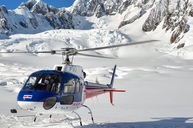 Franz Josef: Mountain Scenic Spectacular 40-Min Helicopter Flight - The snow landing near the Main Divide