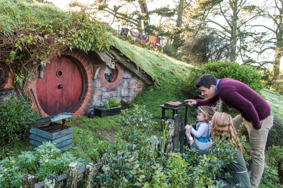 From Matamata: Guided Hobbiton Experience with Bus Transfers - Walking through 12 acres of Hobbit Holes