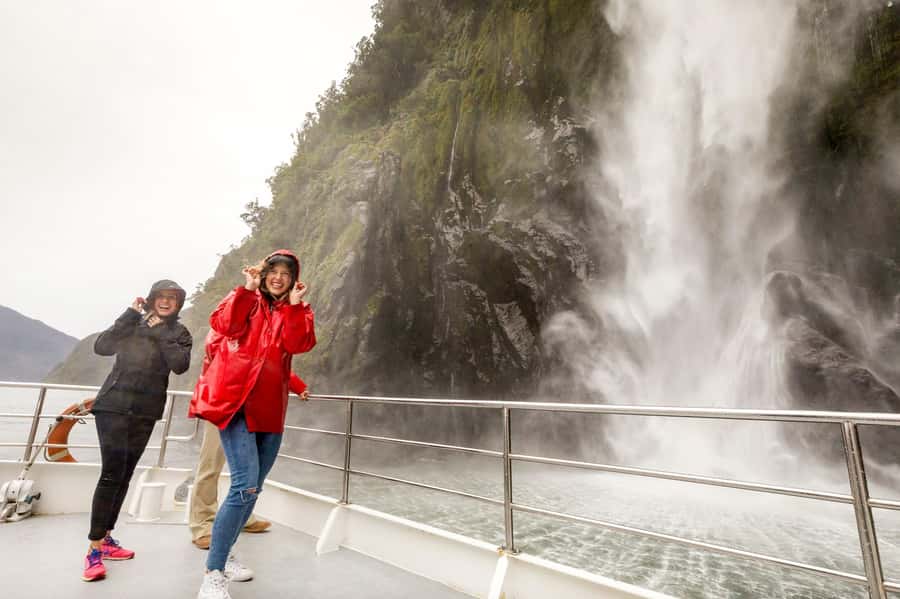 From Queenstown: Milford Sound Day Trip on Premium Coach - Mirror Lakes reward still water and patience