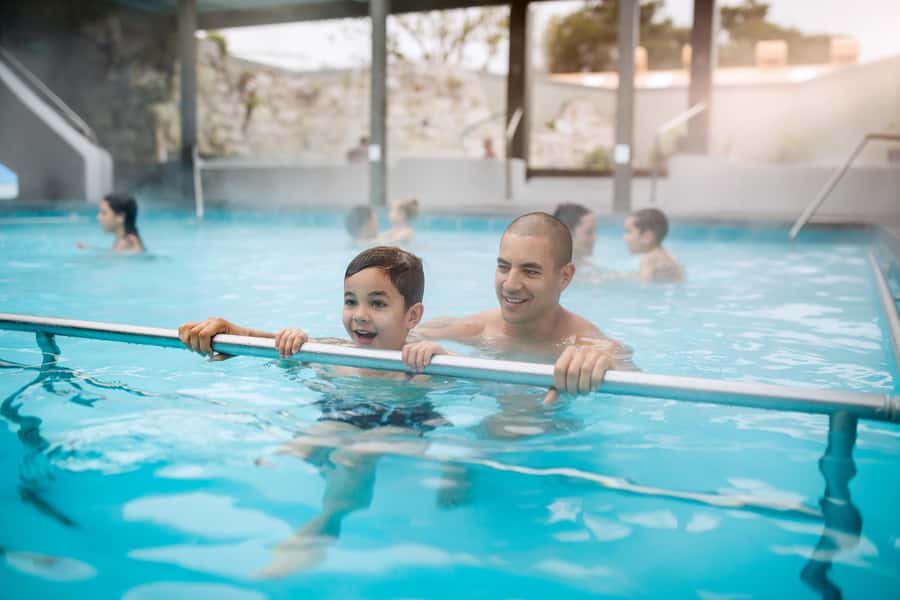 Geothermal and Freshwater Combo Family Pools in New Zealand - The mini hydro slide and younger children
