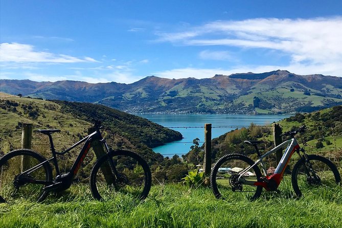 Guided Electric Mountain Bike & Sea Kayak Tour in Akaroa - Meeting point, timing, and booking cautions