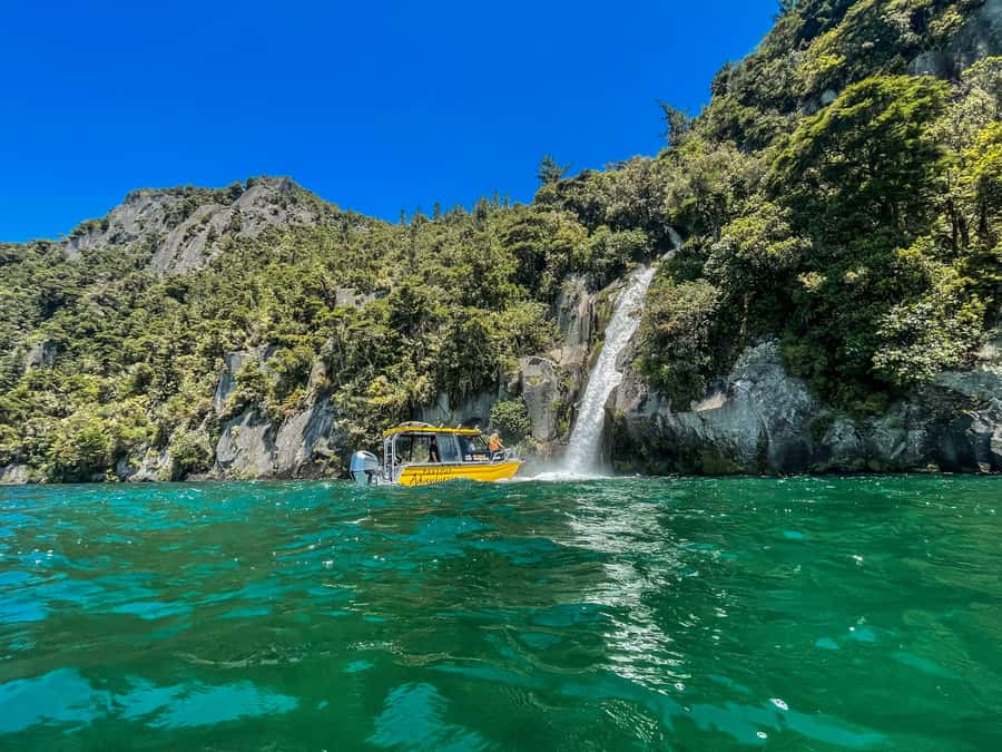 Kinloch: Lake Taupo Catamaran Cruise with Paddleboarding - The first 90 minutes: cliffs, waterfalls, and narrow ravines