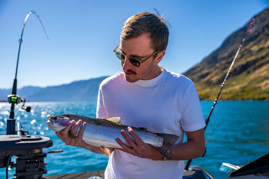 Lake Wakatipu: 3 Hour Fishing Adventure by Boat - Setting out from Queenstown on a quiet electric boat