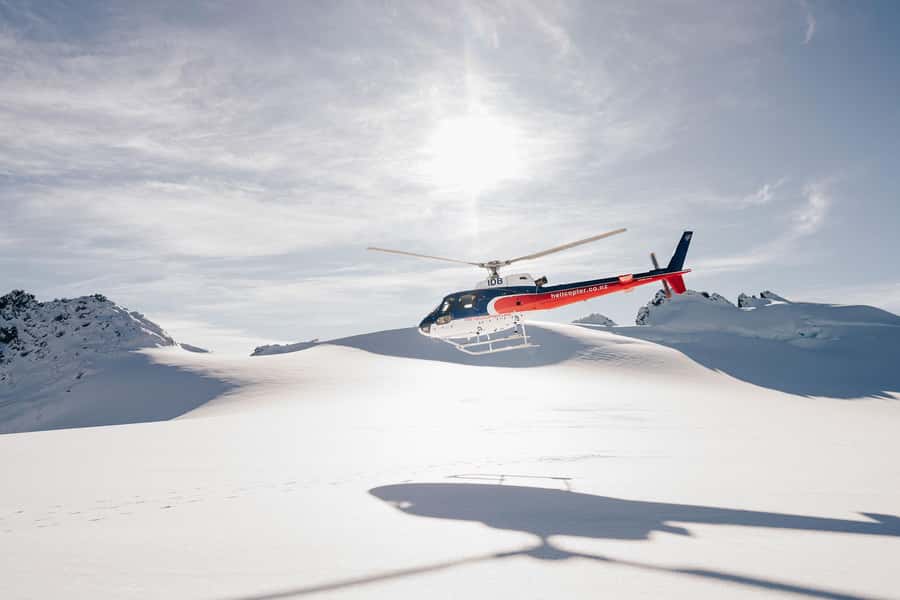 Milford Sound: 1.5-Hour Helicopter Tour with Two Landings - The remote alpine landing and its chance of snow