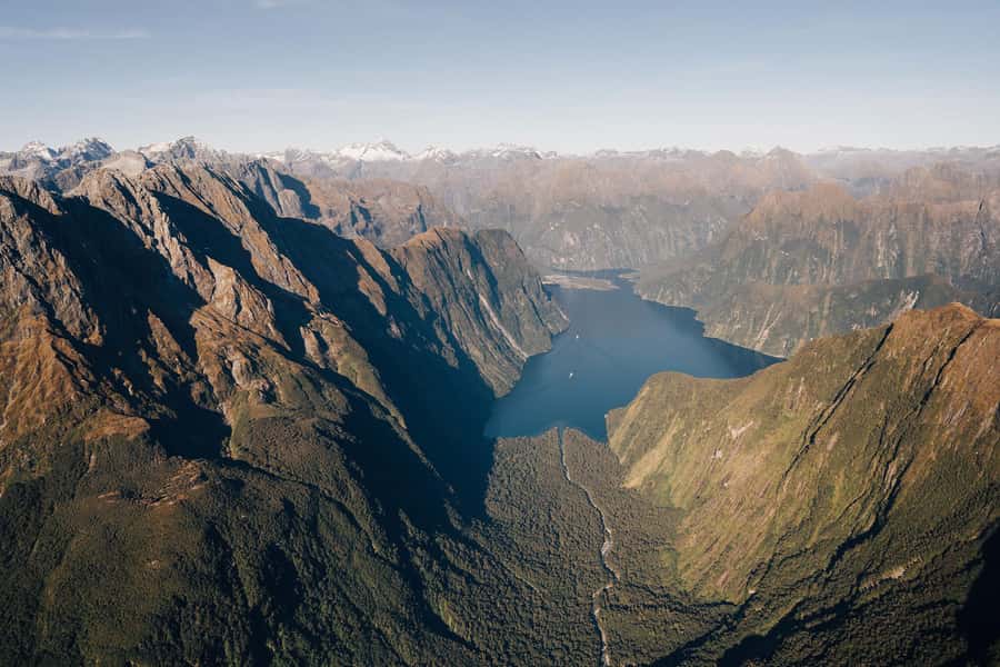 Milford Sound: 1.5-Hour Helicopter Tour with Two Landings - Leaving Queenstown and crossing The Divide