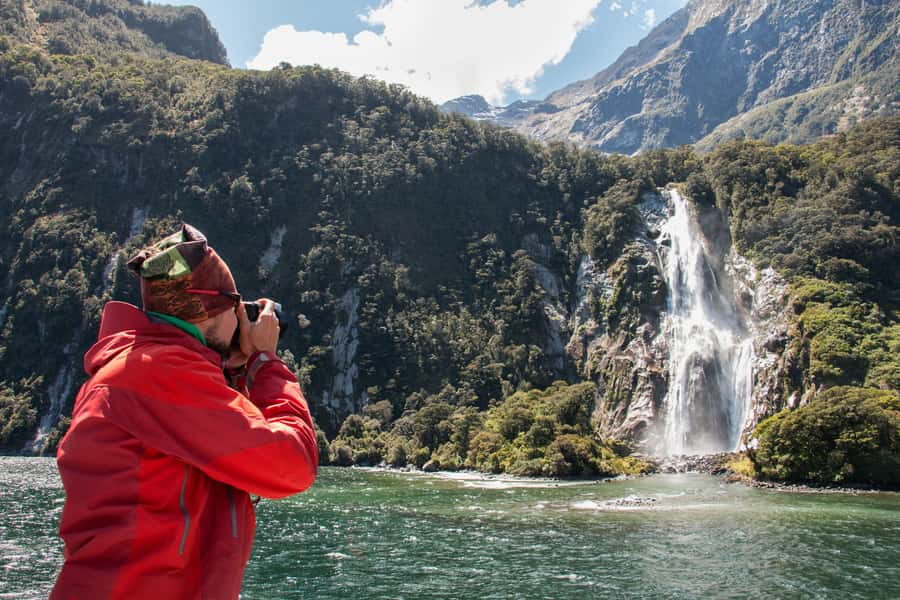 Milford Track: Full Day Guided Hike and Nature Cruise - What to pack for a wet Fiordland day