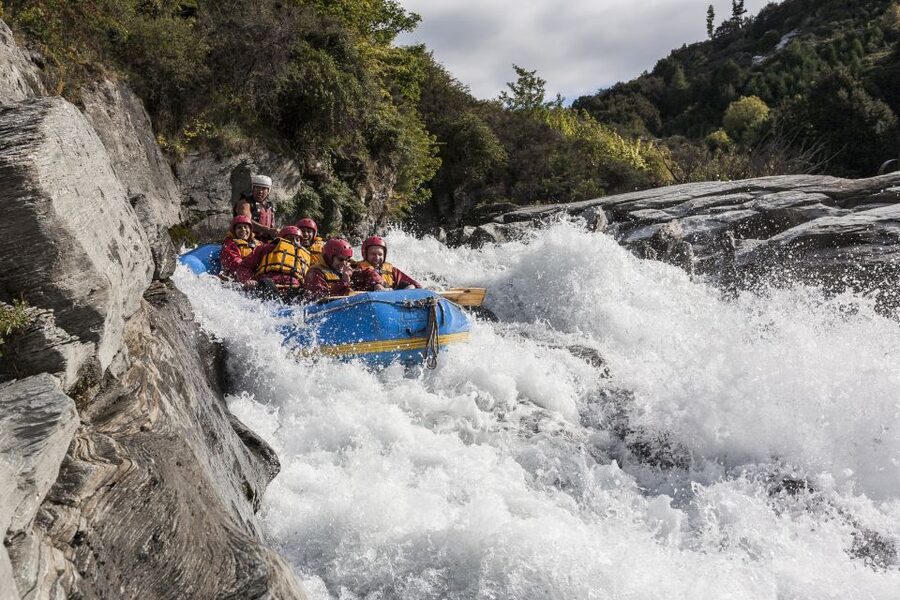 Queenstown: Shotover River Whitewater Rafting Trip - Calm water, swimming, and canyon views