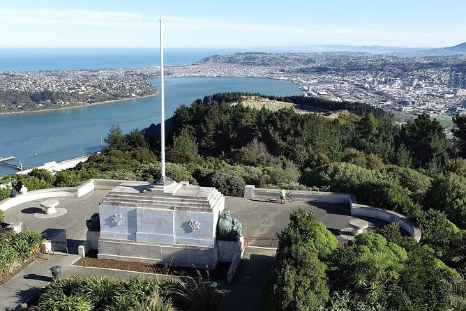Shared Small Group Dunedin City and Peninsula Scenery Day Tour - The Botanic Garden Aviary adds color to the city morning