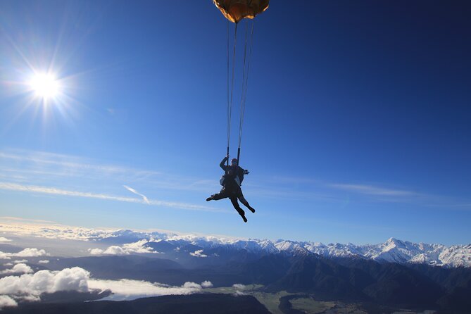 Tandem Skydive 13,000ft from Franz Josef - The scenery changes from ice to coast