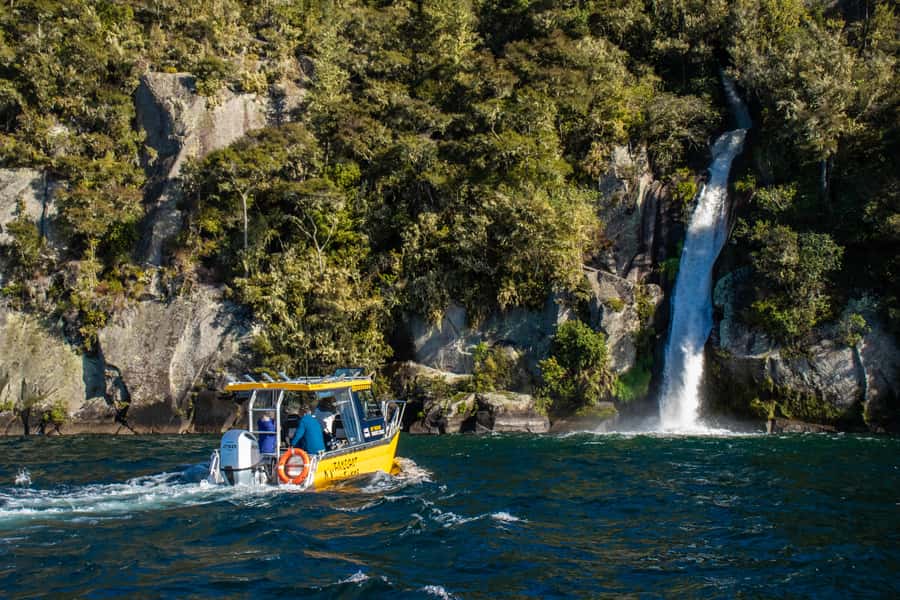 Taupo: Lake Taupo Western Bays Catamaran Tour with Bush Walk - Otupotu Falls from the front of the catamaran