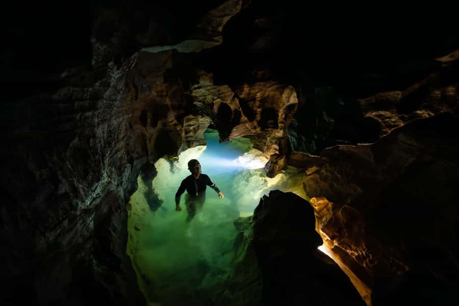 The Waitomo Experience : Okohua Glowworm Cave Tour - Glowworms beneath the limestone ceiling