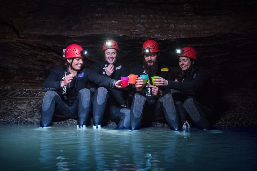 Waitomo Caves Black Abyss Ultimate Caving Experience - Flying through a glowworm gallery