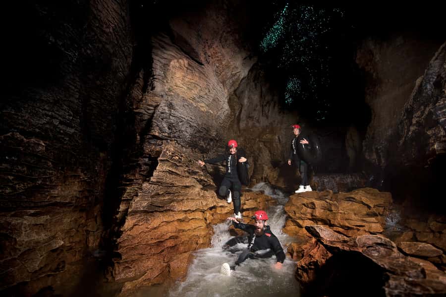 Waitomo Caves Black Abyss Ultimate Caving Experience - Crawling, scrambling, and the underground waterfalls