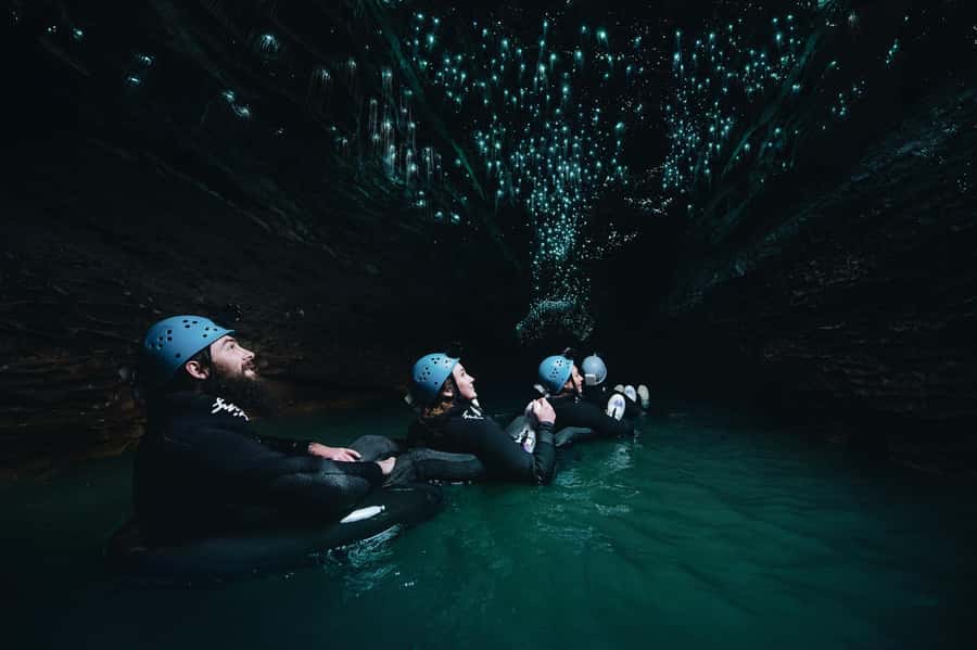 Waitomo Caves: Labyrinth Black Water Rafting Experience - Waterfalls and the small leaps into the cave