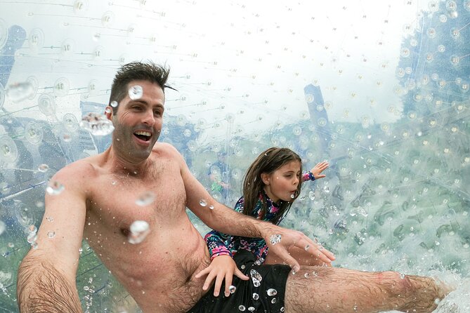 Zorb Inflatable Ball Ride from Mount Ngongotaha in New Zealand - Getting into the ball without looking graceful